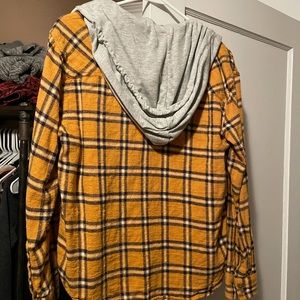Long sleeve flannel with removable hood.